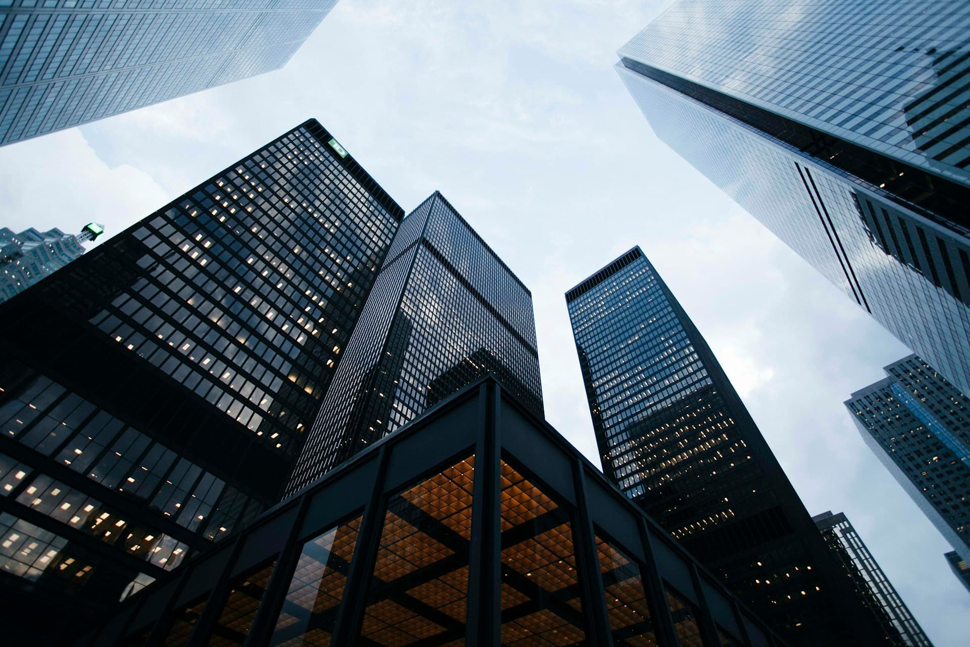 Modern glass architecture looking upward